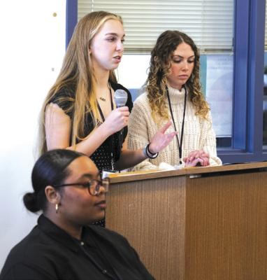 CHS senior Chloe Wright, left, spoke about the need for wellness services for students. 