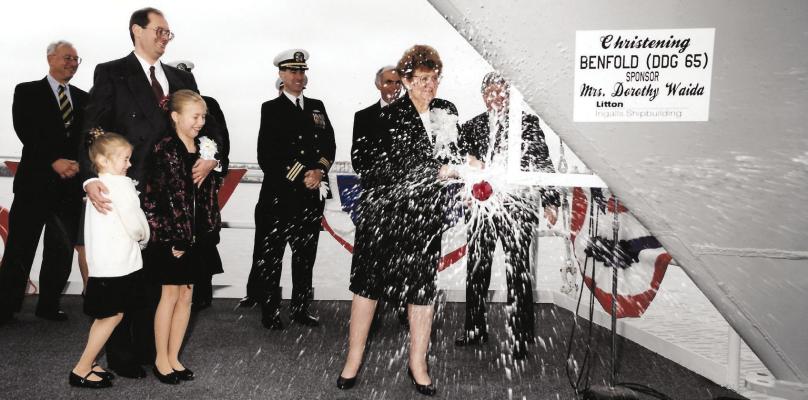 Edward Benfold’s widow, Dorothy, christens the USS Benfold in 1994.