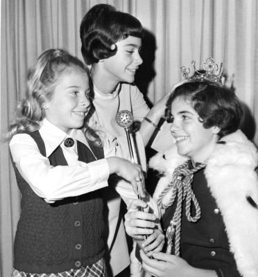 Marybeth Falzone (center), the 1968 Gimbels Thanksgiving Queen and Martha Ann Carter (left), the 1969 runner up, both of Collingswood, crown 1969 Queen Patricia Anne Gallagher.photo courtesy of the Carter/Shaw family